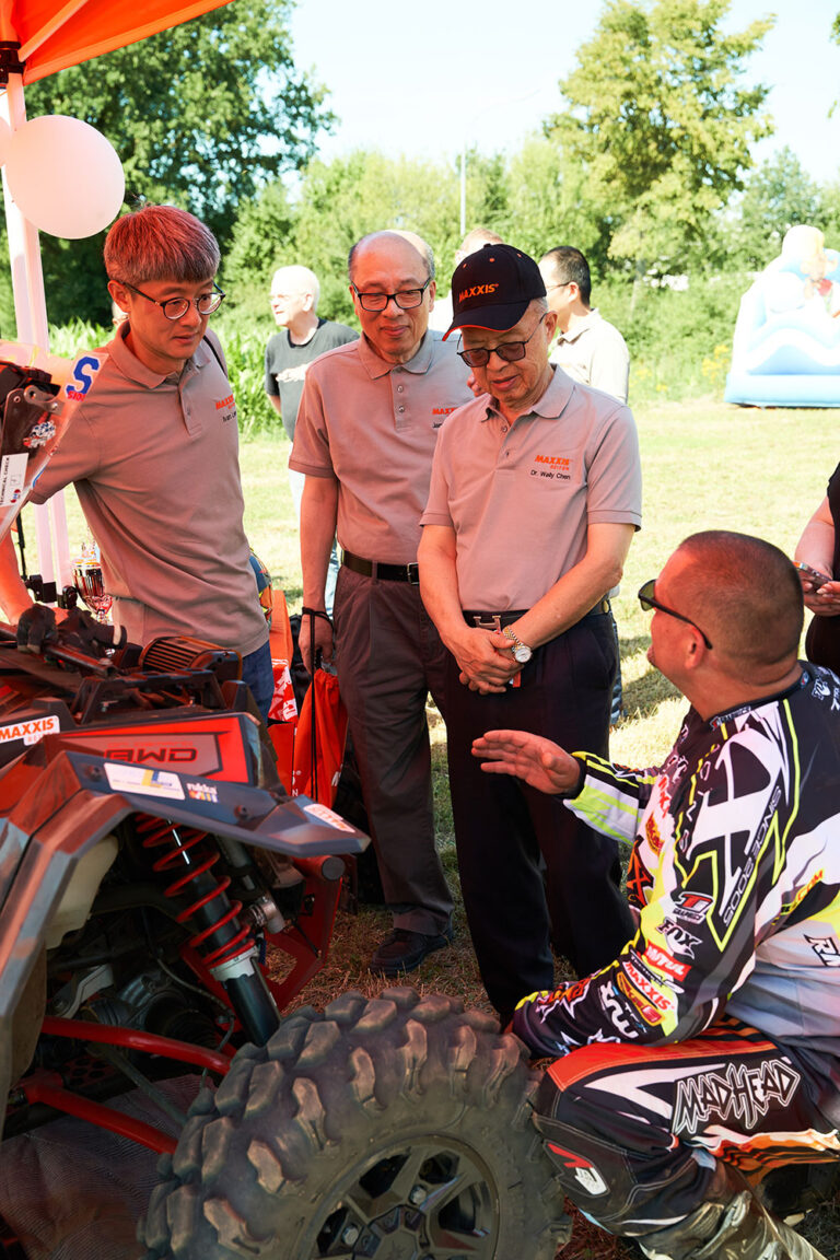 ATV racer speaks to Chairman Chen.