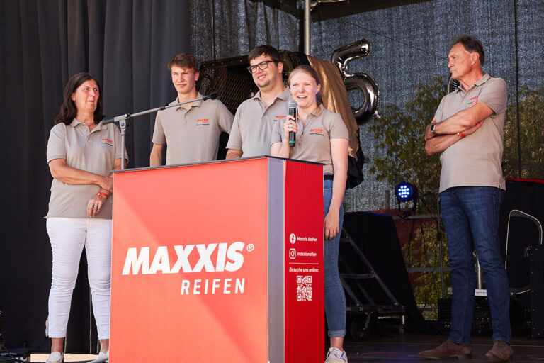 Maxxis International GmbH team speaking to the crowd.