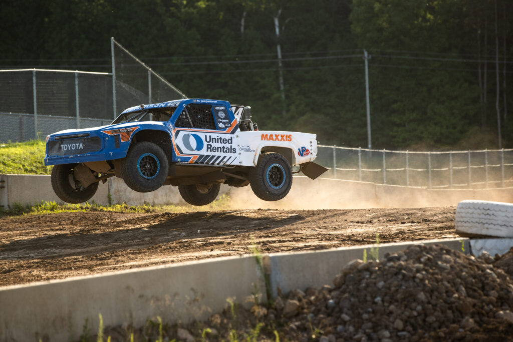 Race truck getting air