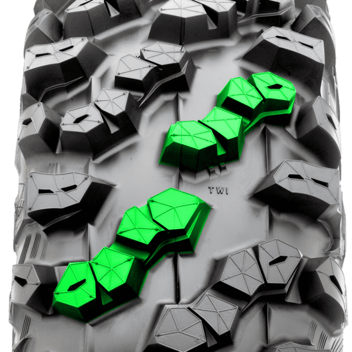 Tread section of Maxxis Carnivore RT tire colored green.