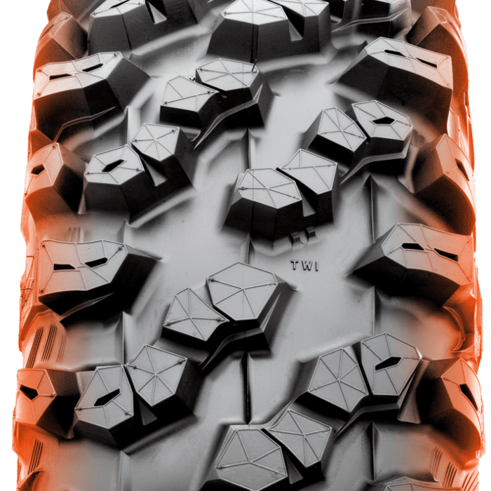 Tread section of Maxxis Carnivore RT tire colored orange.
