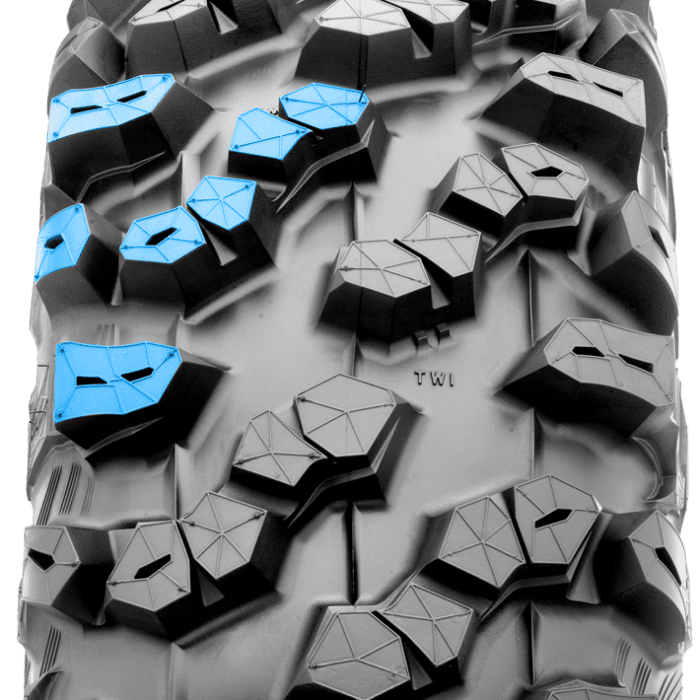 Tread section of Maxxis Carnivore RT tire colored blue.