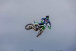 MaddParts.com Kawasaki rider Freddie Noren in mid-air on his motorcycle.