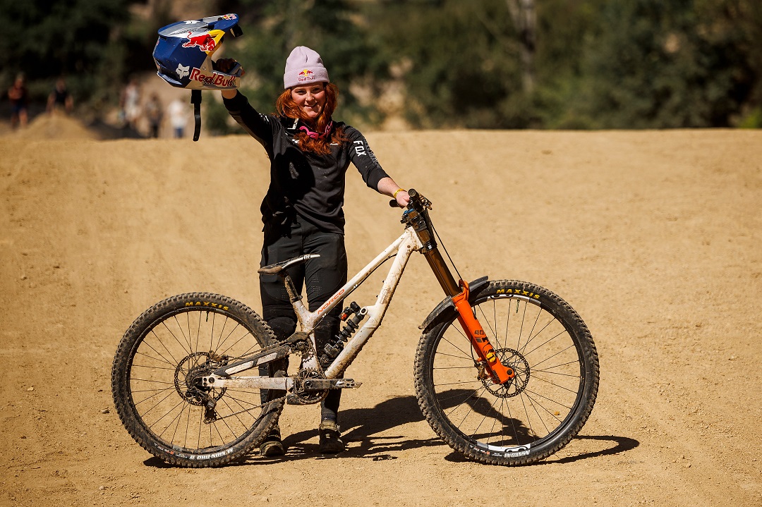 Gracey posing with her race winning bike