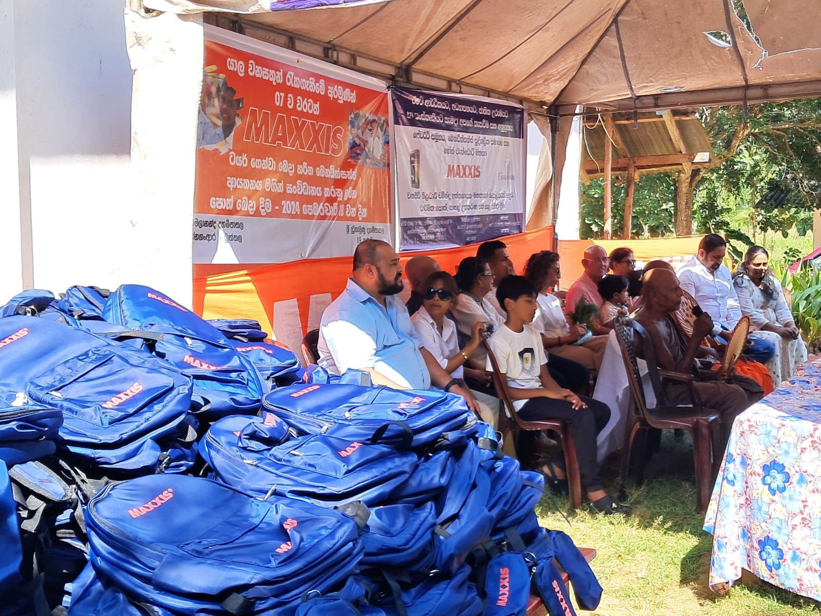 People sitting at an event.