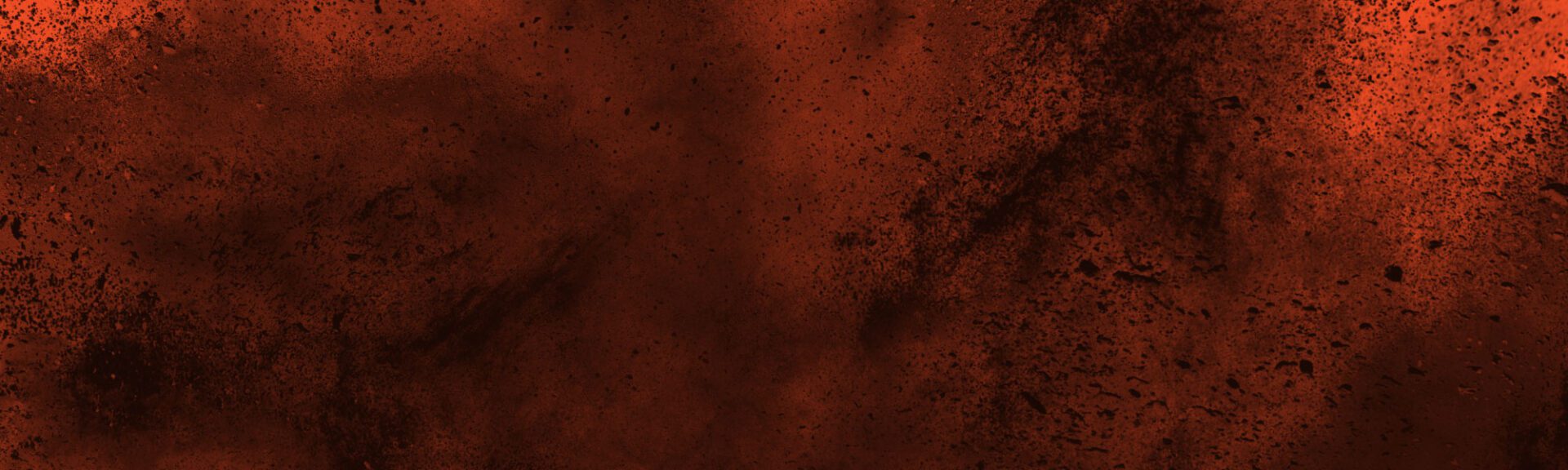 Abstract dirt splash on orange background.