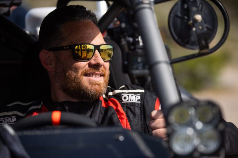 Desert racer, Ian Kennedy, smiling.