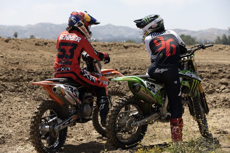 Ronnie Renner talking to Axell Hodges on their motocross bikes