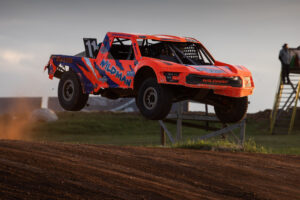 Maxxis sponsored driver getting some air on the track.