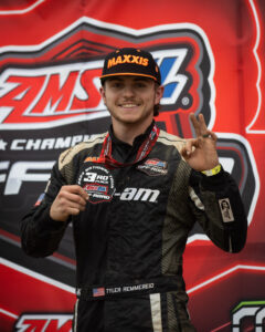Maxxis athlete on the podium following a race.