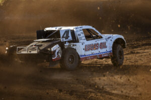 Maxxis truck sliding on the race course