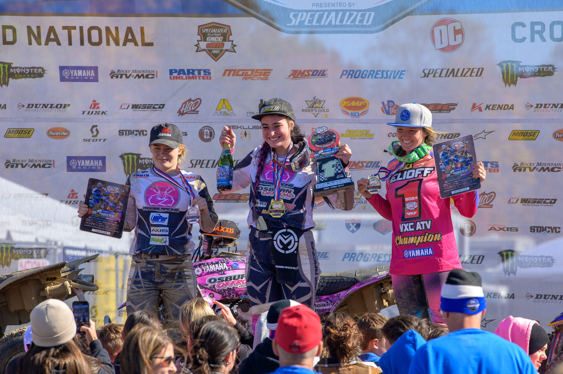 Chloe Harper celebrating a GNCC WXC win.