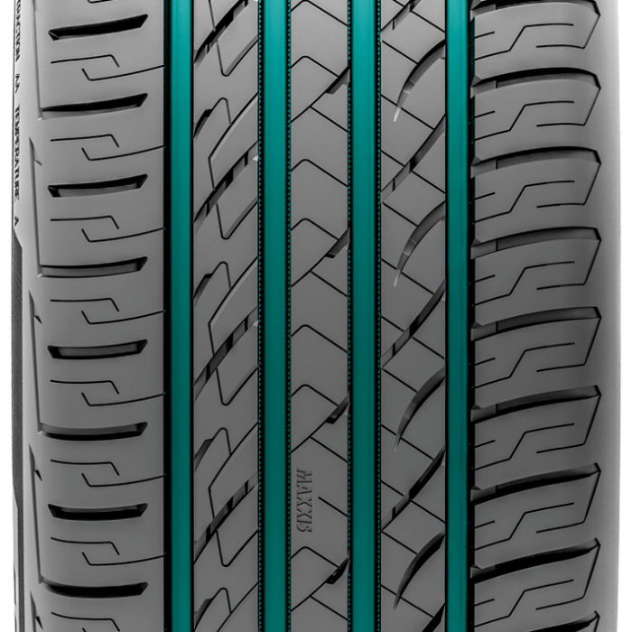 Tight tread shot of a tire with green colored tread.