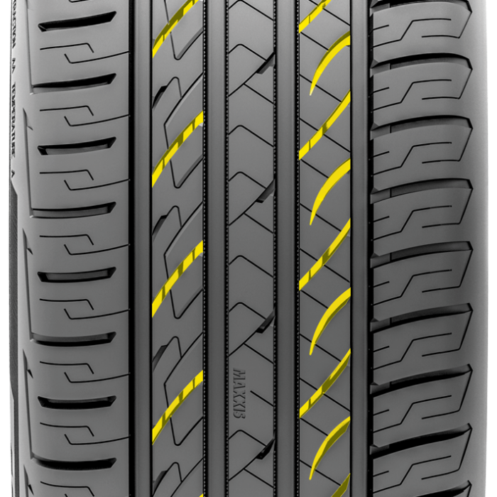 Tight tread shot of a tire with yellow colored tread.