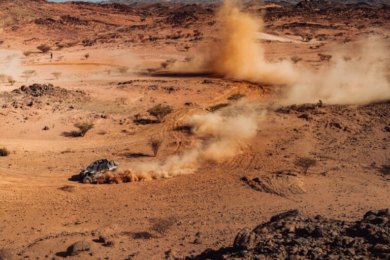 Hunter Miller Racing through the Saudi Arabian Desert in his yellow and black Factory Can-Am fitted with Maxxis Roxxzilla tires at the 2025 Dakar Rally.