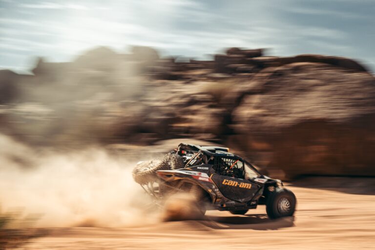 Hunter Miller Racing through the Saudi Arabian Desert in his yellow and black Factory Can-Am fitted with Maxxis Roxxzilla tires at the 2025 Dakar Rally.