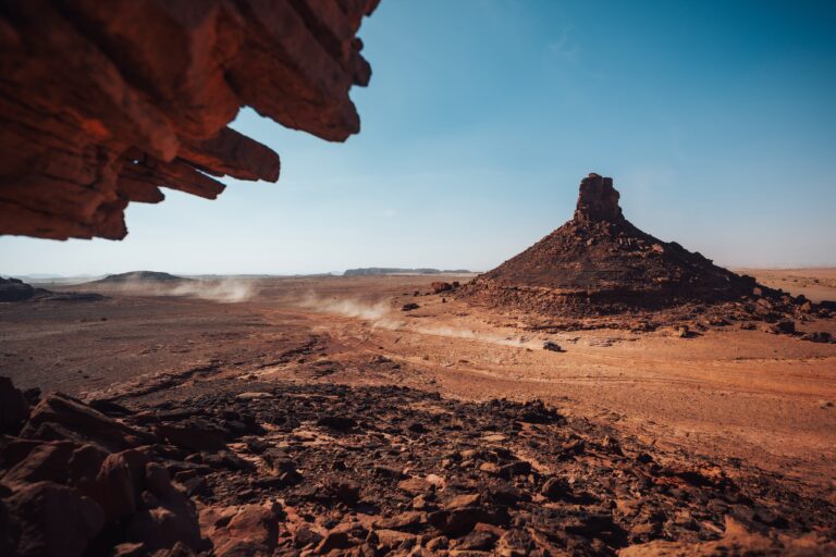 Hunter Miller Racing through the Saudi Arabian Desert in his yellow and black Factory Can-Am fitted with Maxxis Roxxzilla tires at the 2025 Dakar Rally.