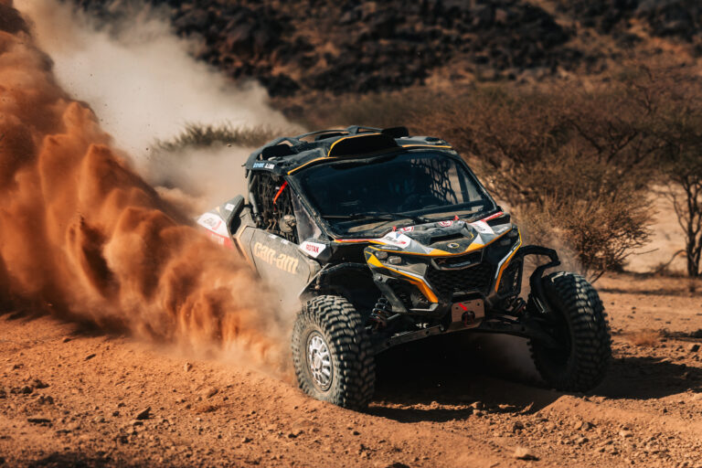 Hunter Miller Racing through the Saudi Arabian Desert in his yellow and black Factory Can-Am fitted with Maxxis Roxxzilla tires at the 2025 Dakar Rally.