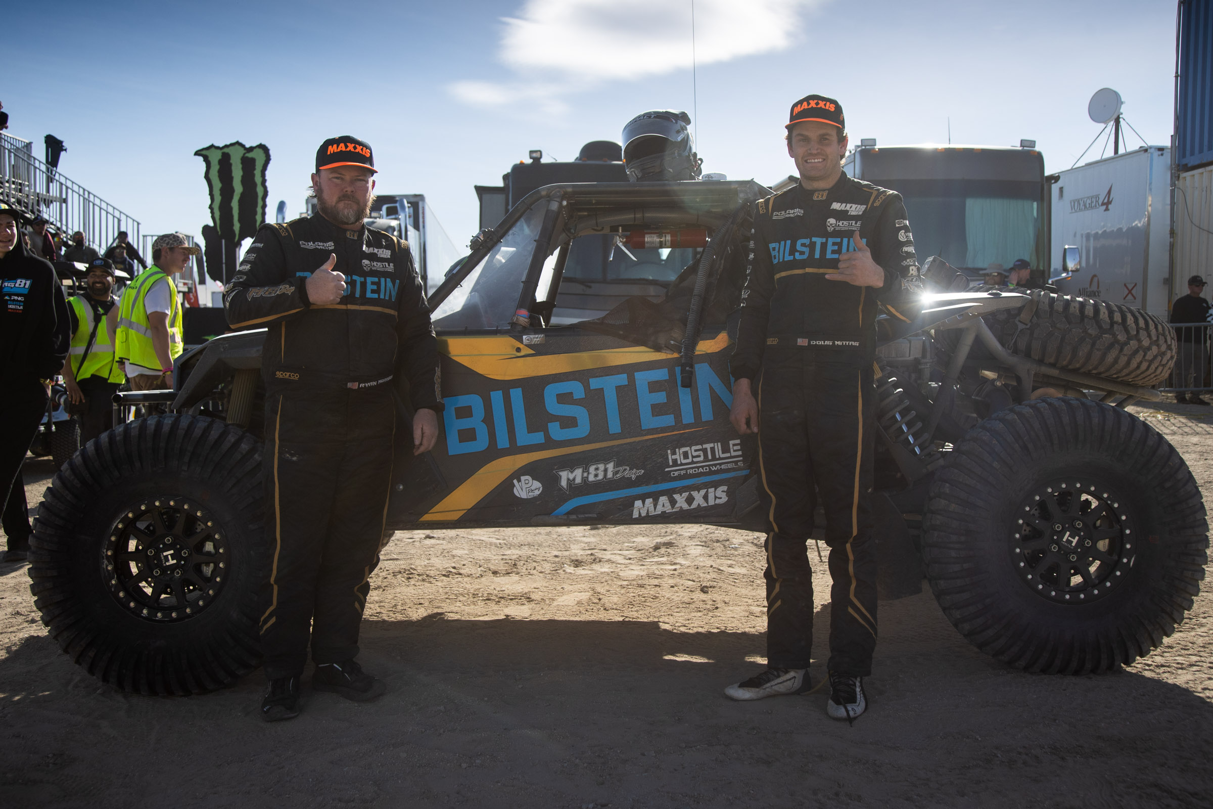 Doug Mittag and his Bilstein tuned Polaris on the podium of the KOH Desert Challenge.