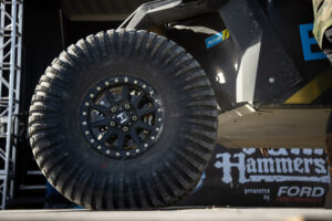 Doug Mittag and his Bilstein tuned Polaris on the podium of the KOH Desert Challenge.