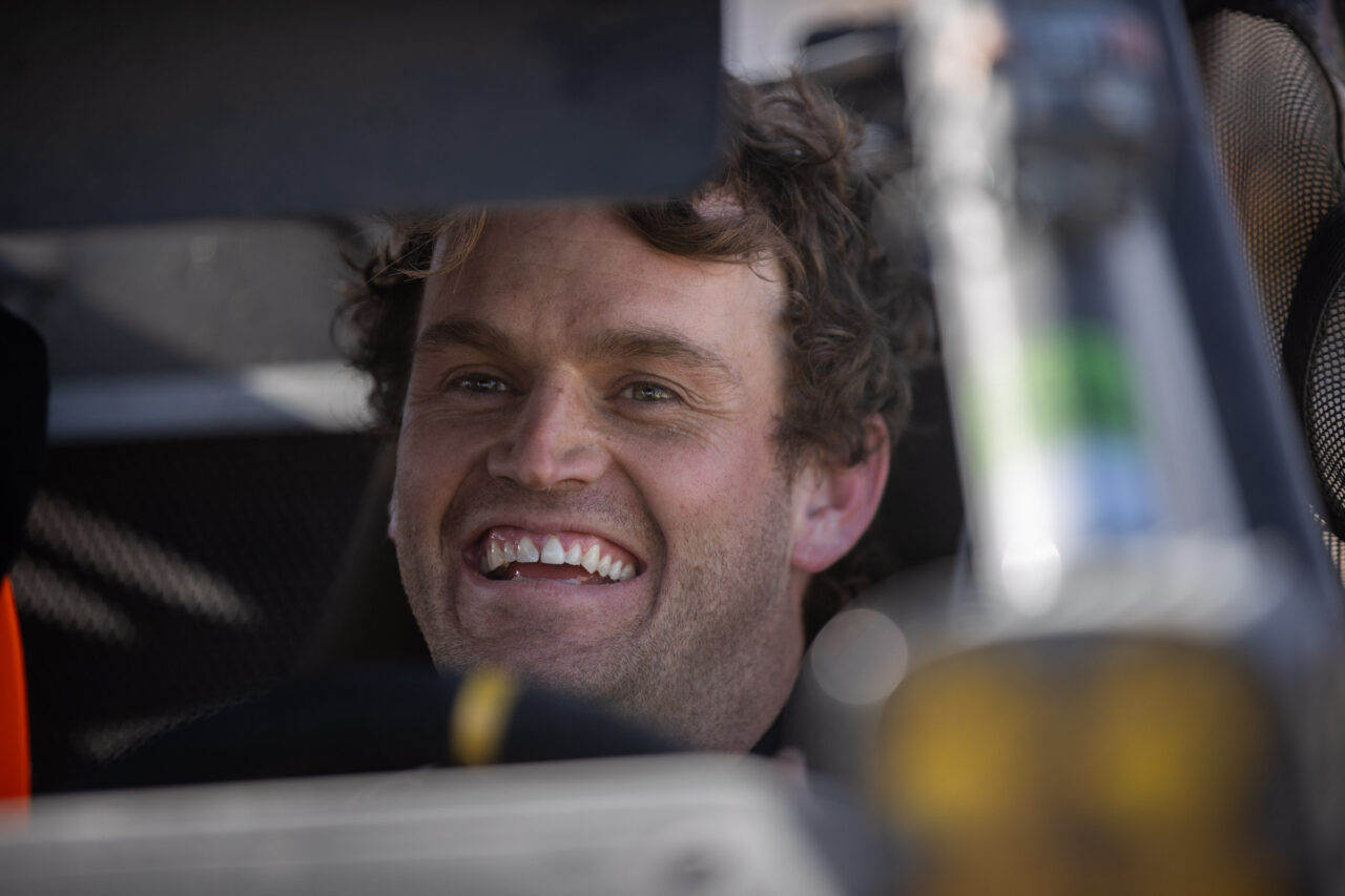 Doug Mittag and his Bilstein tuned Polaris on the podium of the KOH Desert Challenge.