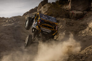 Cody Miller pinning it up a rocky hill in his Yellow and Black CanAm.