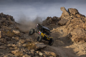 Cody Miller pinning it down a rocky hill in his Yellow and Black CanAm.