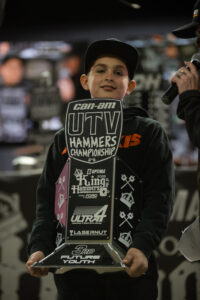 Vito Ranuio Jr. Hoisting his KOH Youth class trophy.