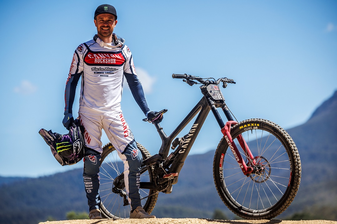 Troy Brosnan posing with bike