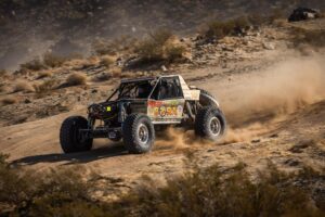 Maxxis athlete Justin Wicks in the desert 4400 car