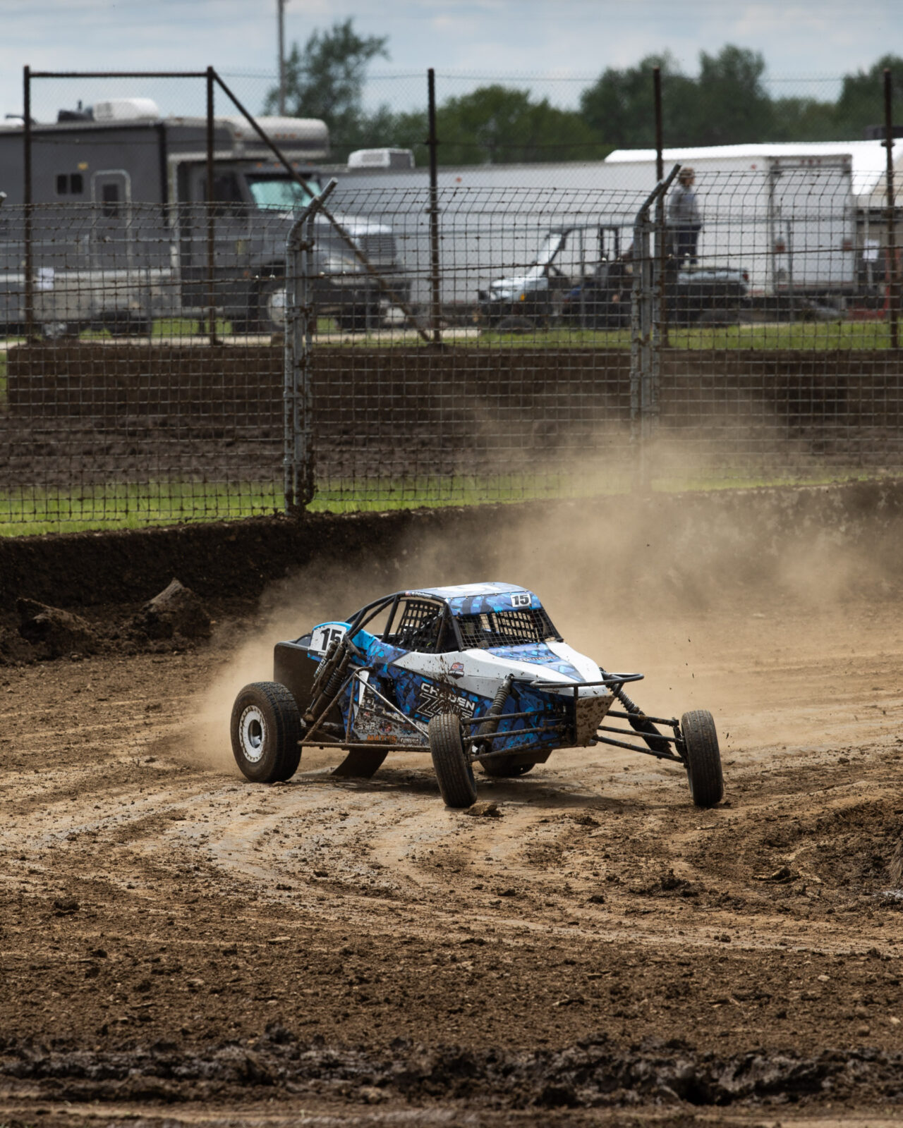 Maxxis athlete at CHAMP offroad, sliding through dirt