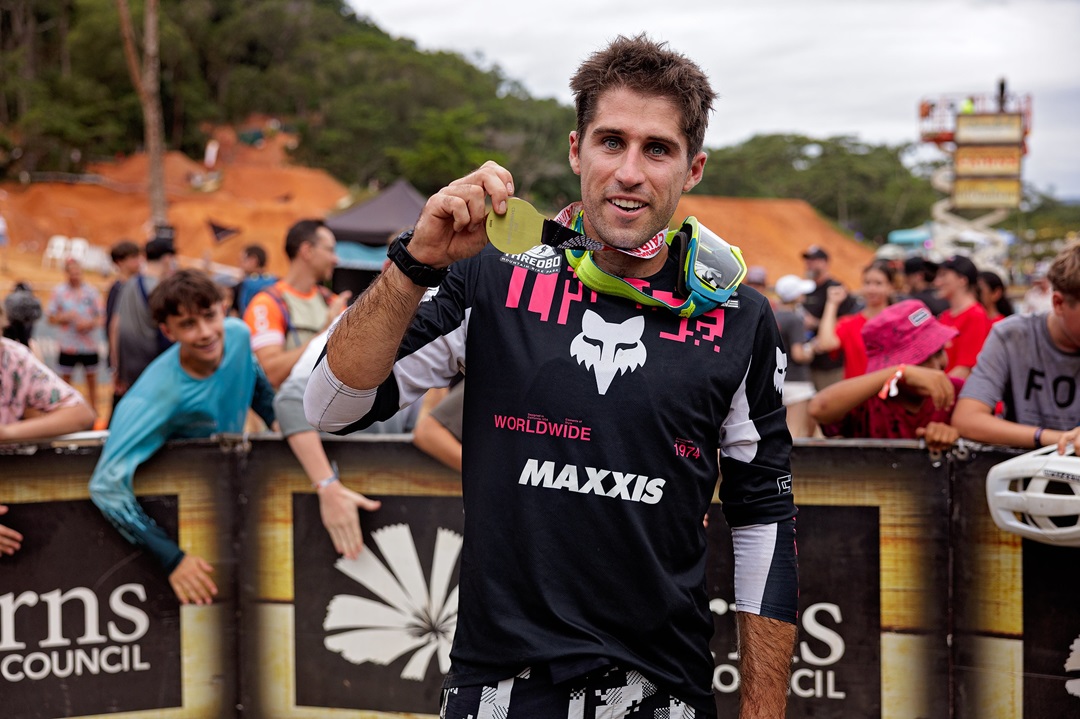 Frew posing with his medal