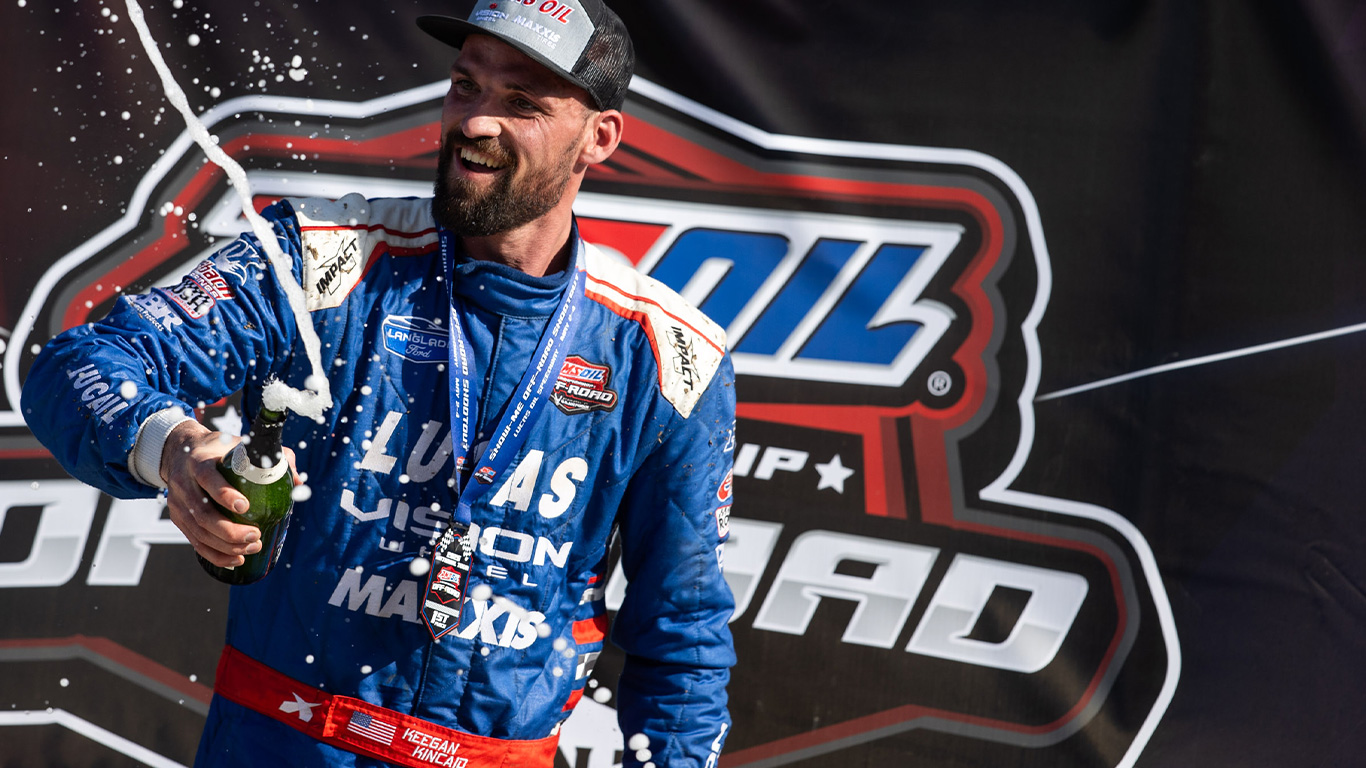 Maxxis athlete celebrating at CHAMP offroad