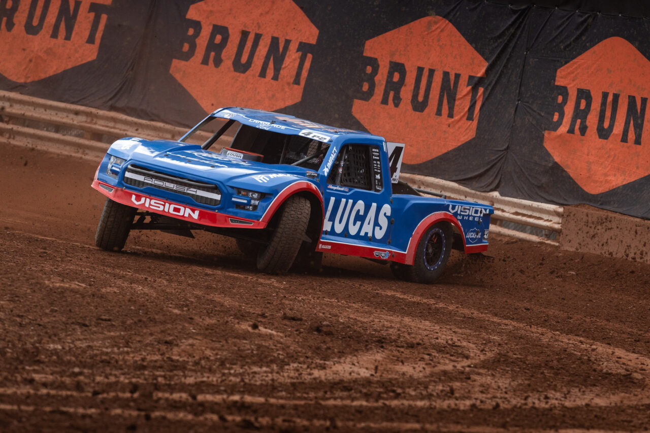 Maxxis athlete racing on the track