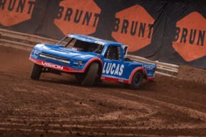 Maxxis athlete racing on the track