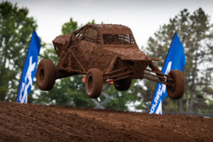 Maxxis athlete racing on the track