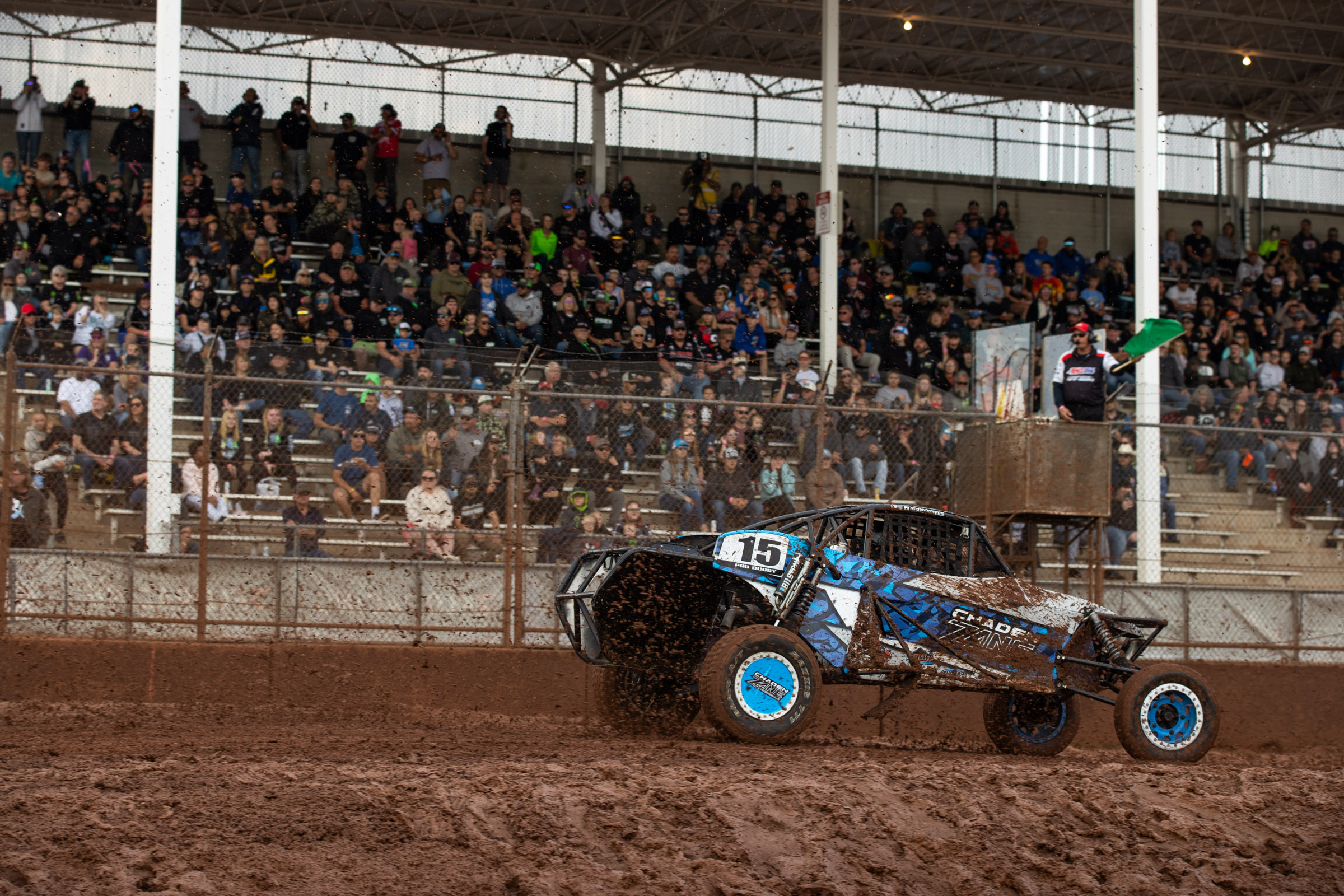 Maxxis athlete in front of a crowd