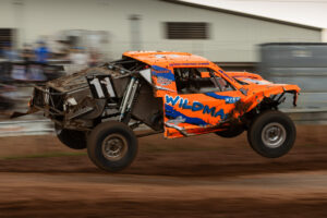 Maxxis athlete racing on the track