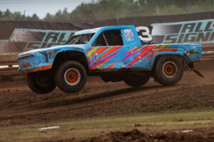 Maxxis athlete racing on the track