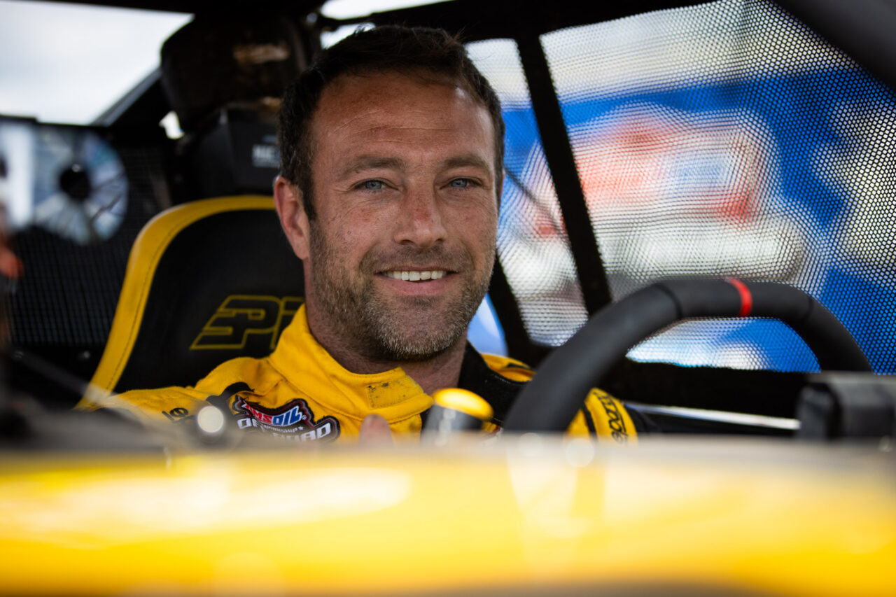 Maxxis athlete in his car