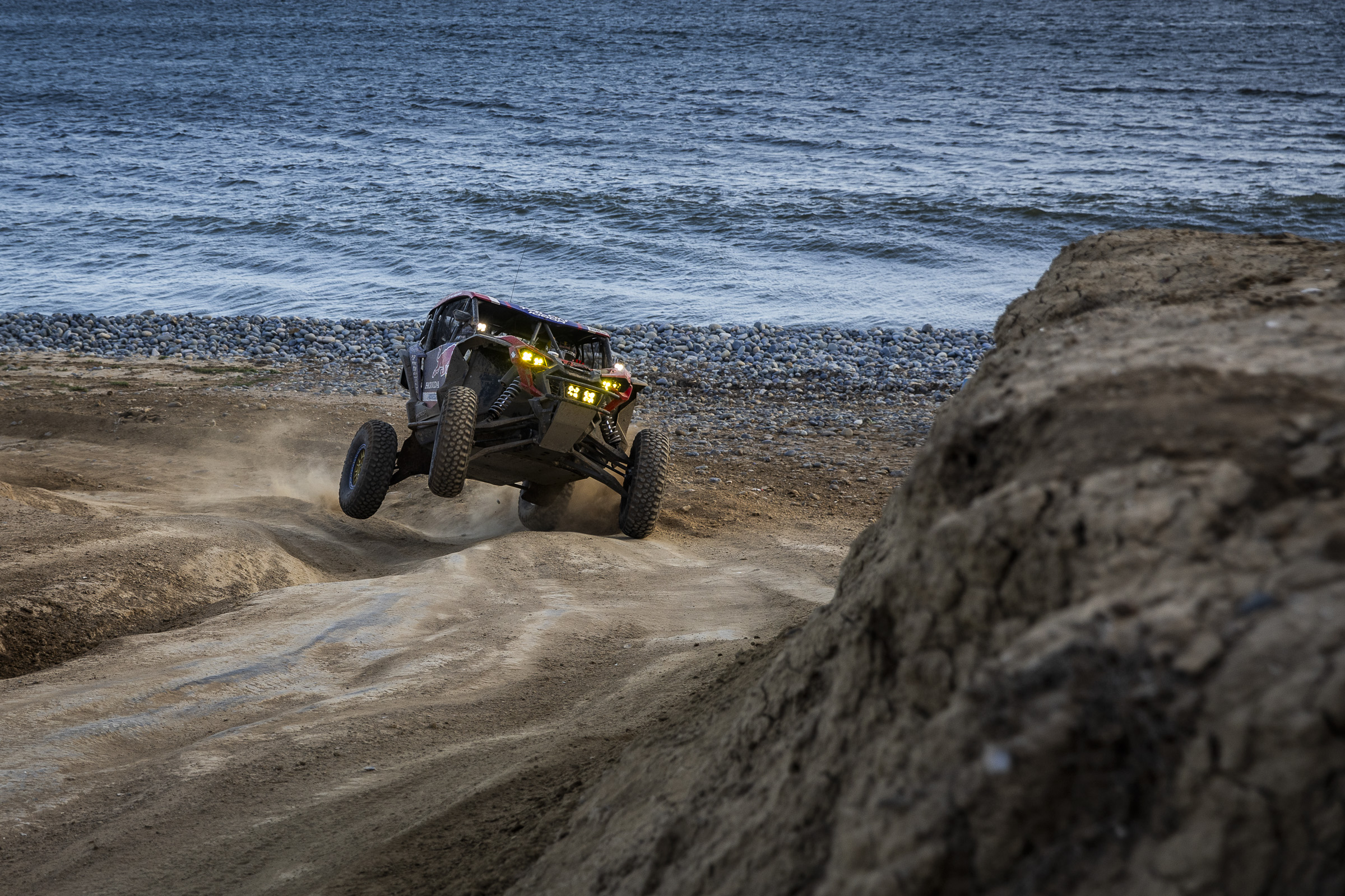 Honda talon driving in front of the ocean