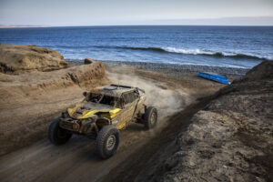 SXS in front of the water