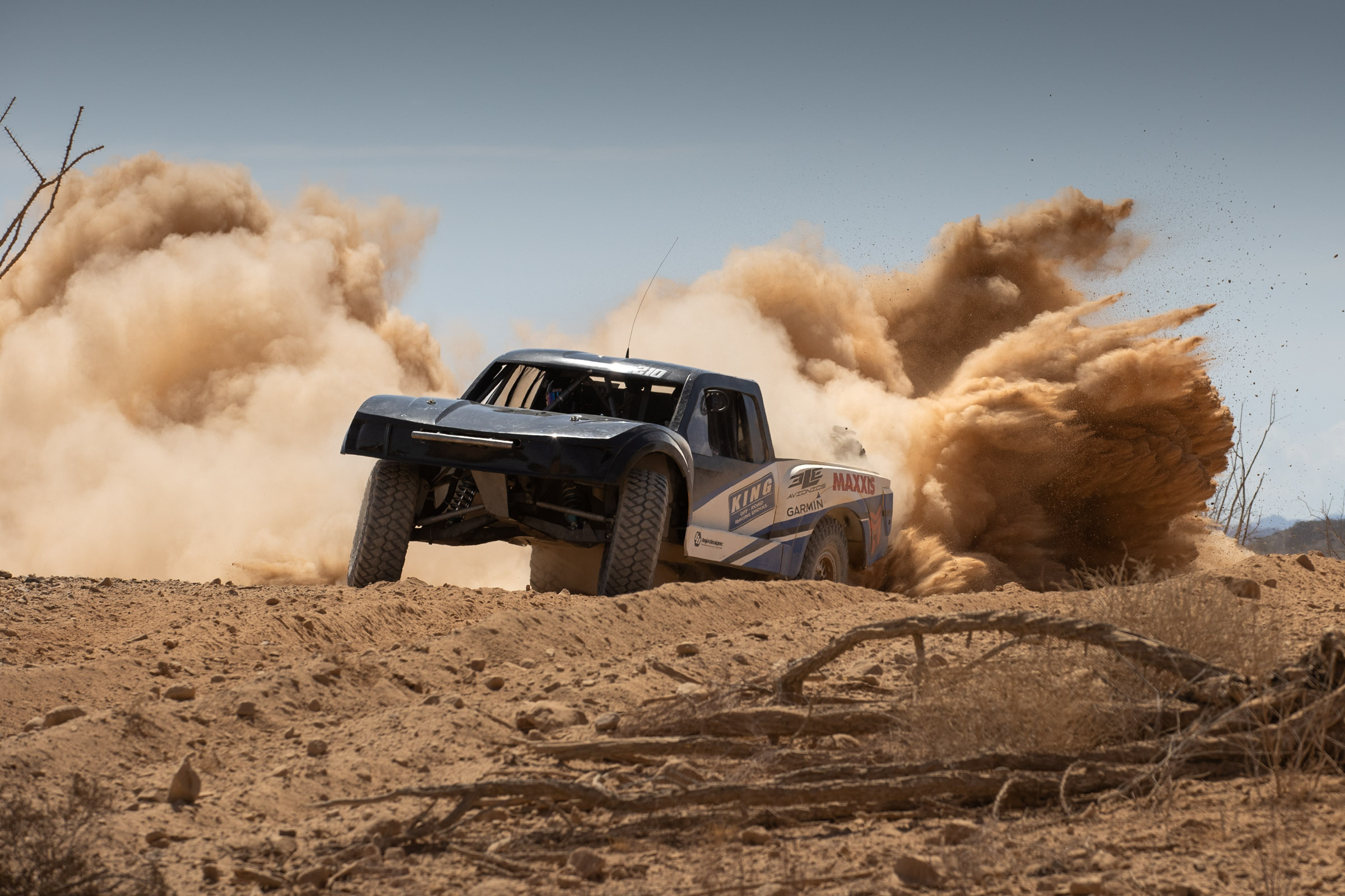 Maxxis Sponsored Eric Huestead blowing up the dirt with his all wheel drive Trick Truck.
