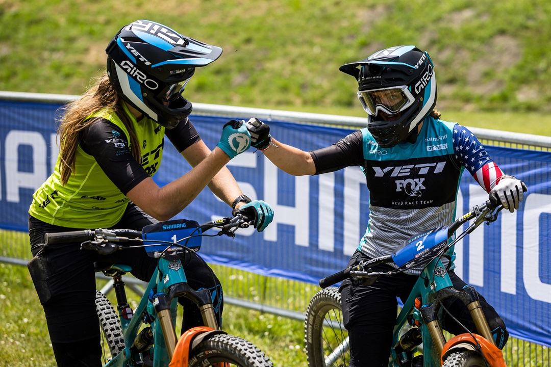 Yeti's junior riders fist bumping