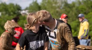 Maxxis GNCC athlete Hunter Hart Kissing the love of his life on the cheek after a hard fought win.