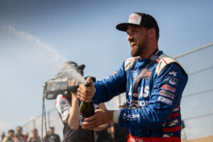 Maxxis athlete celebrating a great round