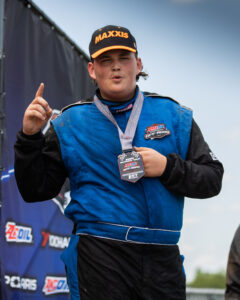 Maxxis athlete on the podium