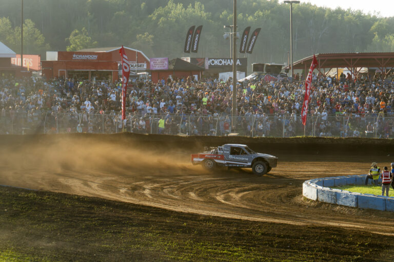 athlete throwing rooster tail at the race