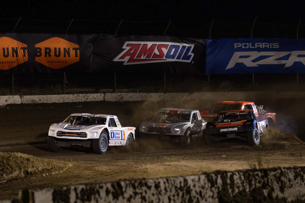 Race trucks battling it out on the course