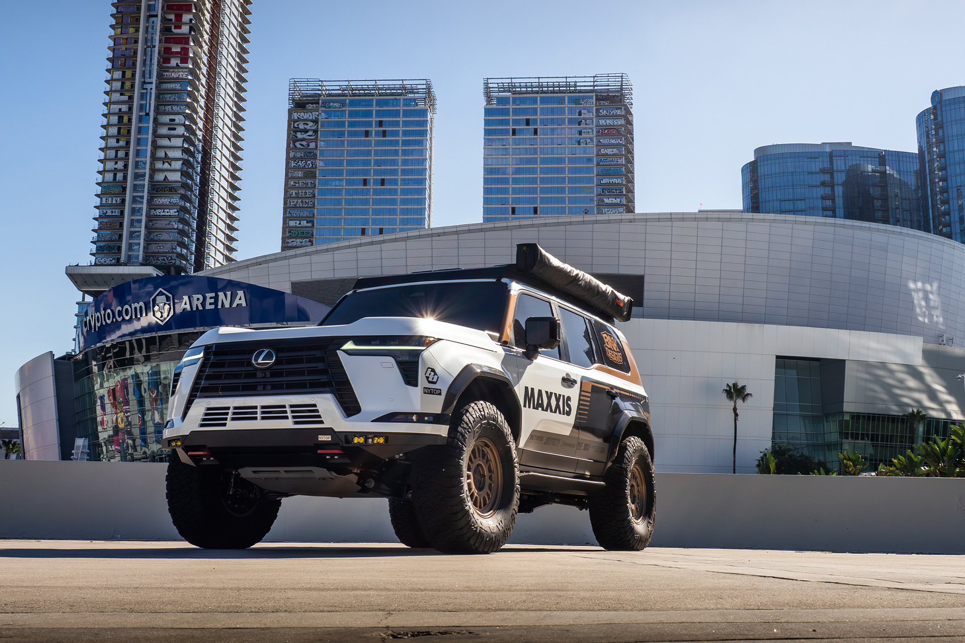 Lexus SUV parked in the city.